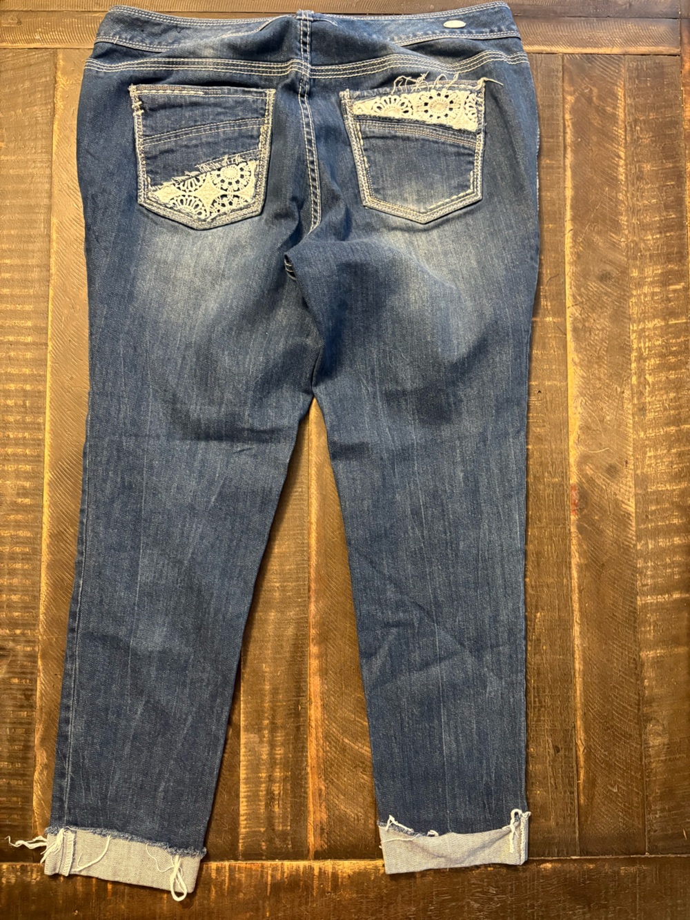 Ariya Distressed Dark Blue Cropped Jeans Cream Crochet Back Pockets Cuffed Legs